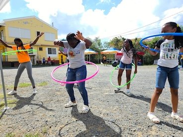 Youth Get Fit event with girls using hula hoop